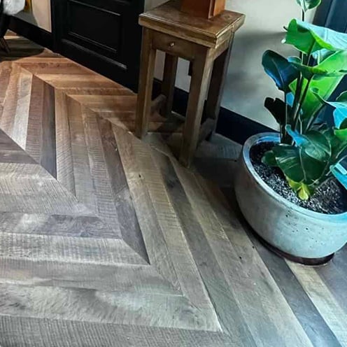 Herringbone natural look, rustic finished wood floor.
