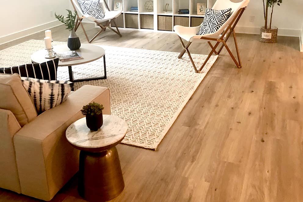 Luxury vinyl plank flooring installed in an informal family room.