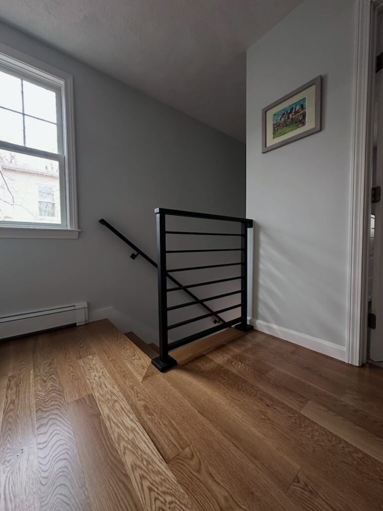 Arlington hardwood floors and stairs with custom handrails